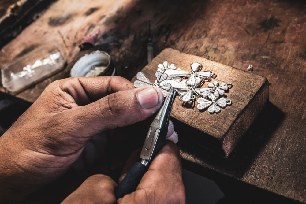 Man working on filigree jewellery in Mompox, Colombia, a town famous for its intricate gold and silver craftsmanship.