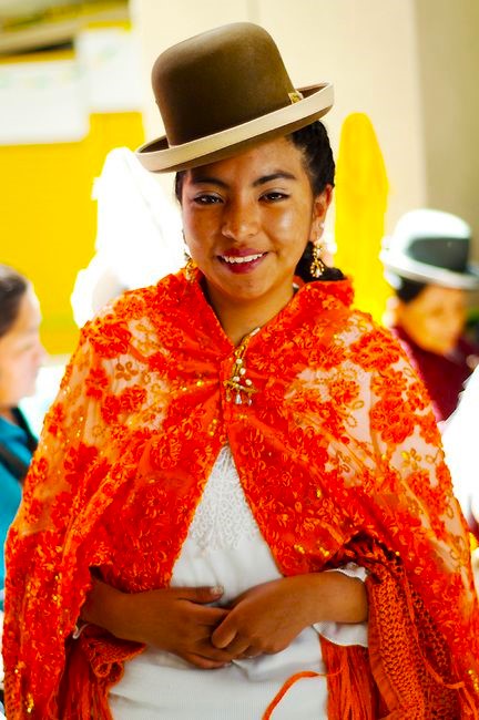 Cholita's women proudly wearing their traditional dress in public offices. Cholita's women proudly wearing their traditional dress in public offices.