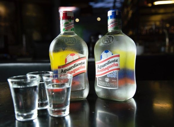 Best food in Latin America must try Aguardiente in Colombia and Ecuador