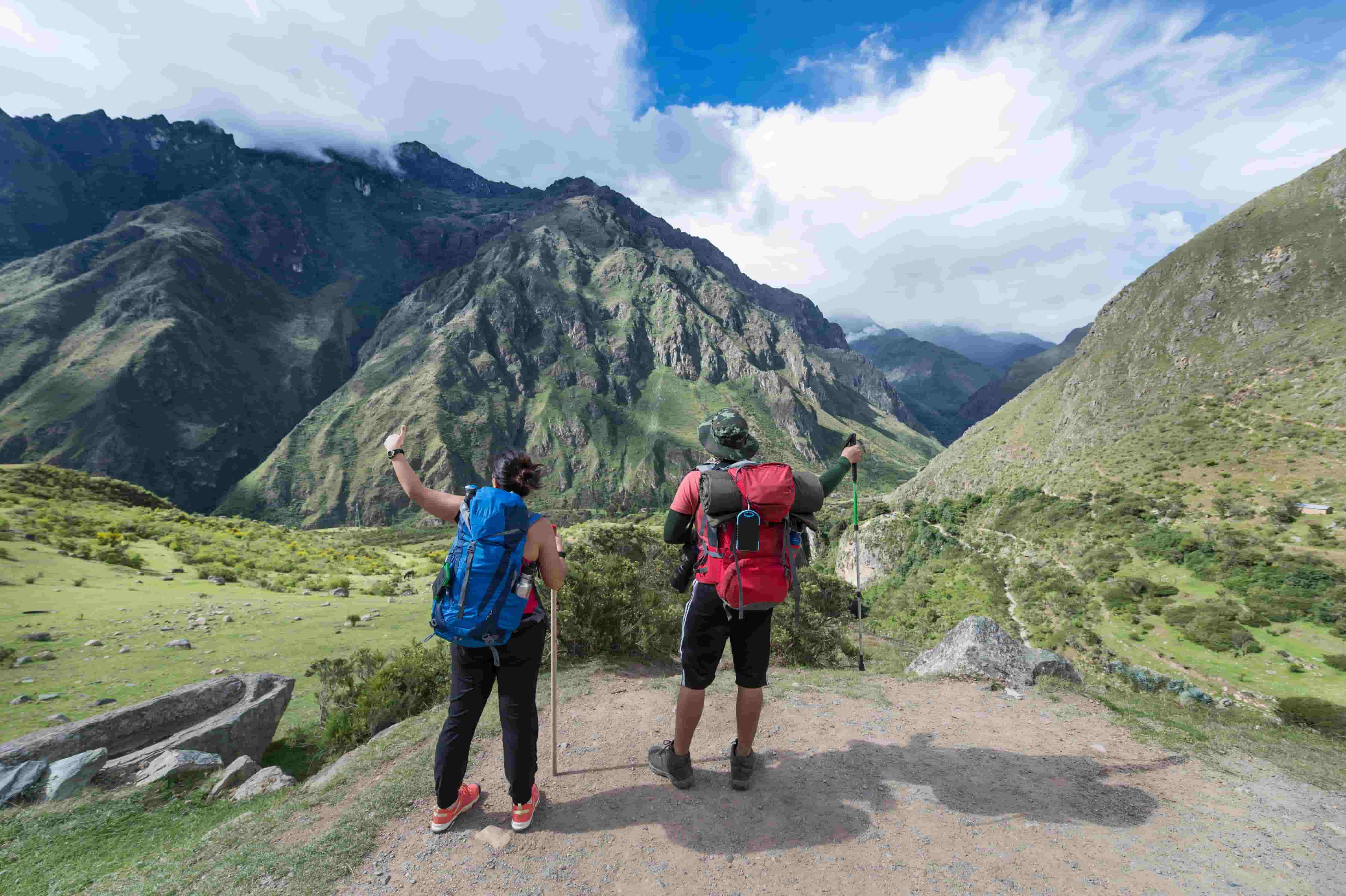 Hiking duo making their way toward the mountains of Peru..